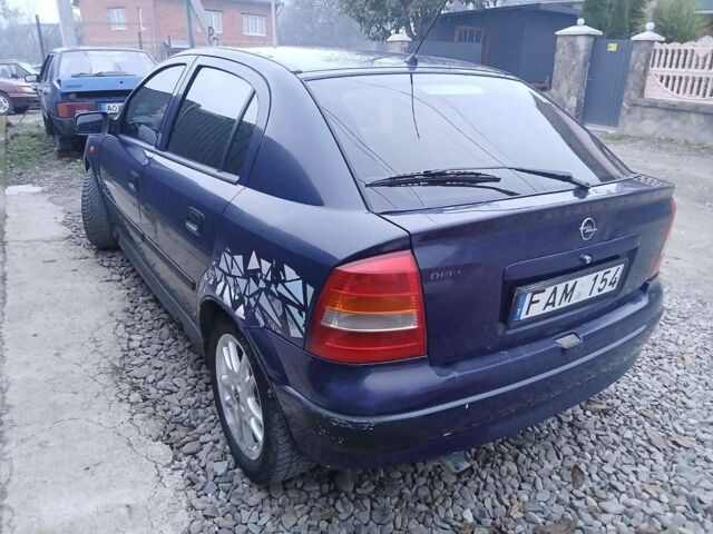 Синий Опель Астра, объемом двигателя 1.6 л и пробегом 280 тыс. км за 950 $, фото 4 на Automoto.ua