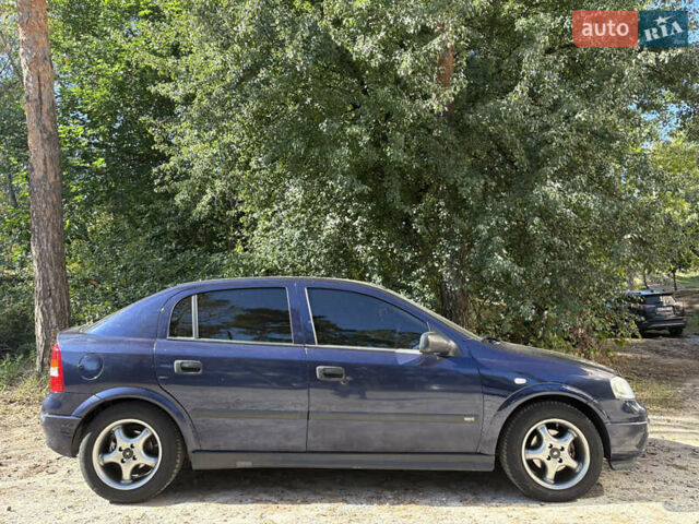 Синий Опель Астра, объемом двигателя 1.6 л и пробегом 205 тыс. км за 3000 $, фото 2 на Automoto.ua