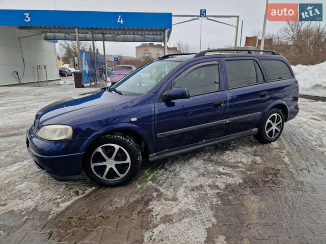 Синий Опель Астра, объемом двигателя 1.7 л и пробегом 305 тыс. км за 3000 $, фото 8 на Automoto.ua