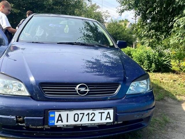 Синій Опель Астра, об'ємом двигуна 1.2 л та пробігом 487 тис. км за 1700 $, фото 1 на Automoto.ua
