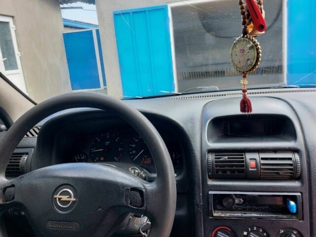 Синий Опель Астра, объемом двигателя 1.7 л и пробегом 219 тыс. км за 3000 $, фото 5 на Automoto.ua