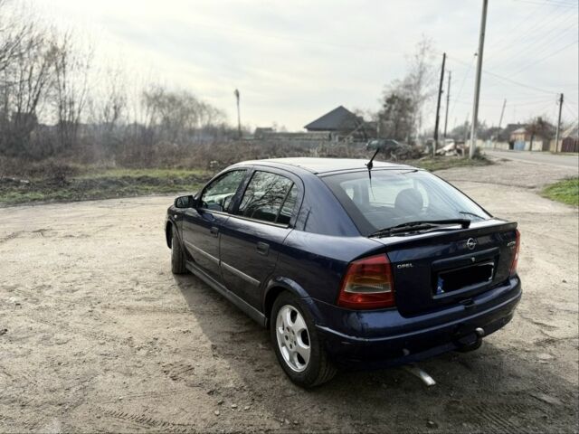 Синий Опель Астра, объемом двигателя 2 л и пробегом 195 тыс. км за 1900 $, фото 6 на Automoto.ua