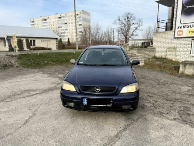 Синий Опель Астра, объемом двигателя 2 л и пробегом 195 тыс. км за 1900 $, фото 1 на Automoto.ua