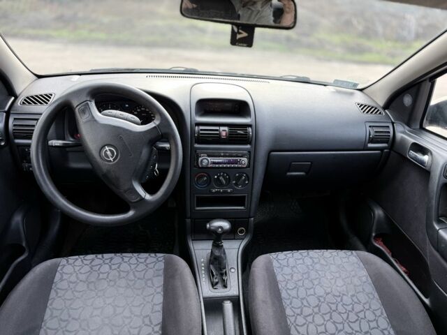 Синий Опель Астра, объемом двигателя 2 л и пробегом 195 тыс. км за 1900 $, фото 9 на Automoto.ua