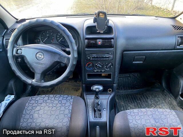 Синий Опель Астра, объемом двигателя 2 л и пробегом 300 тыс. км за 2899 $, фото 1 на Automoto.ua