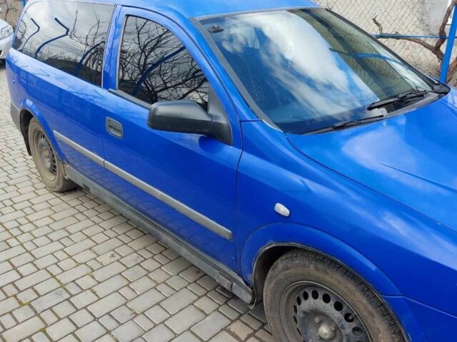 Синий Опель Астра, объемом двигателя 1.7 л и пробегом 219 тыс. км за 3000 $, фото 4 на Automoto.ua