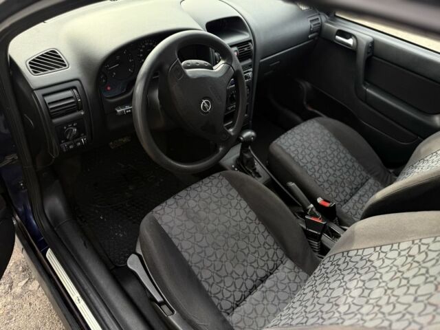 Синий Опель Астра, объемом двигателя 2 л и пробегом 195 тыс. км за 1900 $, фото 8 на Automoto.ua