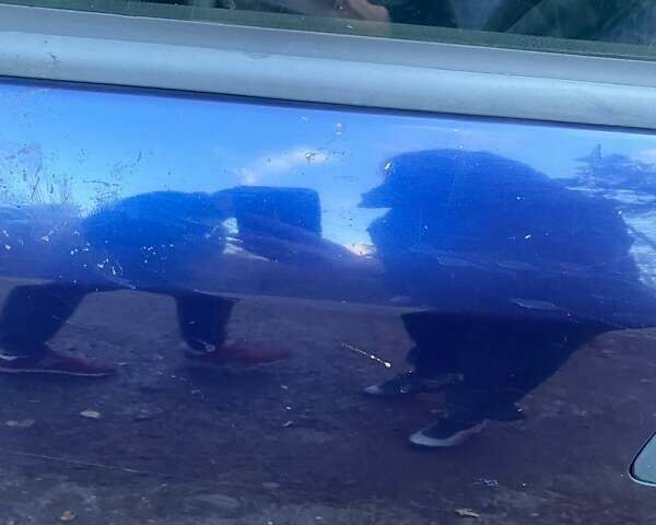 Синий Опель Астра, объемом двигателя 2 л и пробегом 395 тыс. км за 2500 $, фото 2 на Automoto.ua