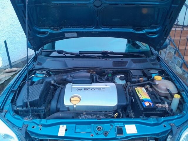 Синій Опель Астра, об'ємом двигуна 6 л та пробігом 235 тис. км за 1600 $, фото 3 на Automoto.ua