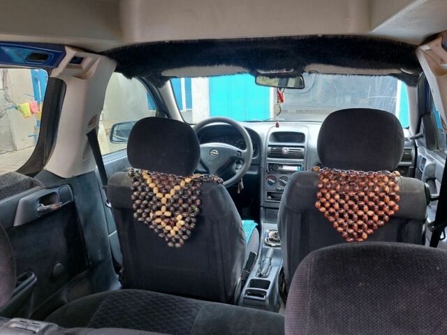 Синий Опель Астра, объемом двигателя 1.7 л и пробегом 219 тыс. км за 3000 $, фото 8 на Automoto.ua