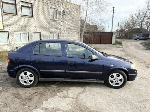 Синий Опель Астра, объемом двигателя 2 л и пробегом 195 тыс. км за 1900 $, фото 3 на Automoto.ua