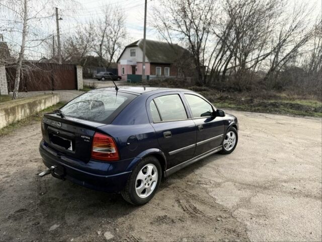 Синий Опель Астра, объемом двигателя 2 л и пробегом 195 тыс. км за 1900 $, фото 4 на Automoto.ua