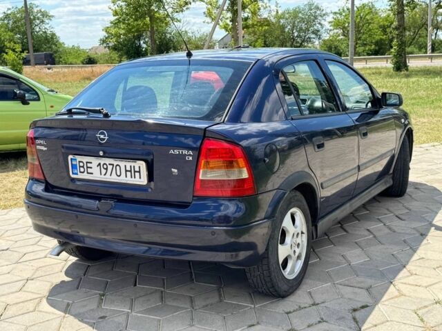 Синій Опель Астра, об'ємом двигуна 2 л та пробігом 335 тис. км за 3004 $, фото 5 на Automoto.ua