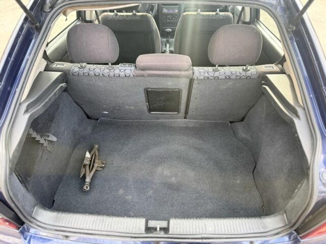 Синий Опель Астра, объемом двигателя 2 л и пробегом 195 тыс. км за 1900 $, фото 12 на Automoto.ua