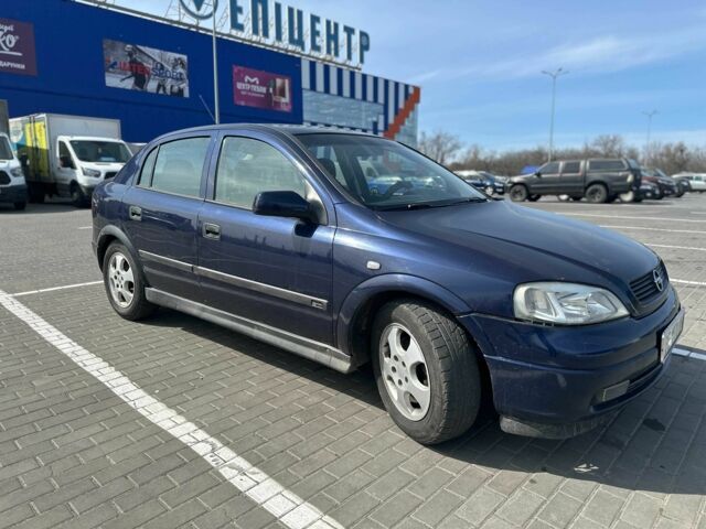 Синий Опель Астра, объемом двигателя 2 л и пробегом 325 тыс. км за 3300 $, фото 2 на Automoto.ua