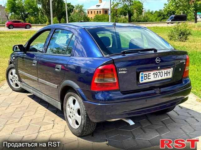Синий Опель Астра, объемом двигателя 2 л и пробегом 330 тыс. км за 3999 $, фото 5 на Automoto.ua