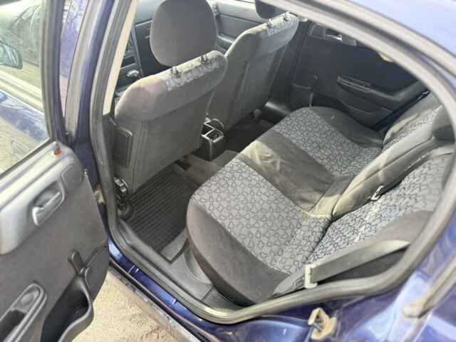 Синий Опель Астра, объемом двигателя 2 л и пробегом 195 тыс. км за 1900 $, фото 10 на Automoto.ua