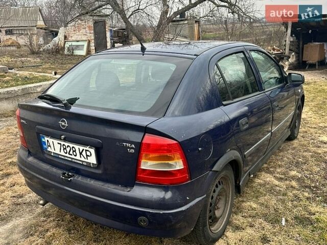 Синий Опель Астра, объемом двигателя 1.6 л и пробегом 370 тыс. км за 800 $, фото 2 на Automoto.ua