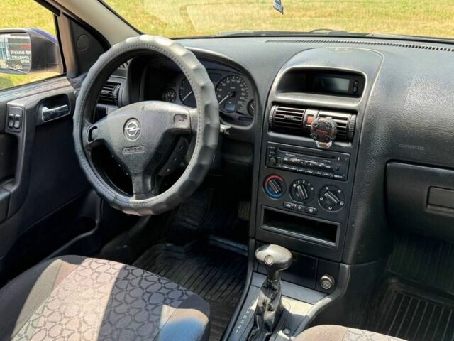 Синій Опель Астра, об'ємом двигуна 2 л та пробігом 335 тис. км за 3004 $, фото 2 на Automoto.ua