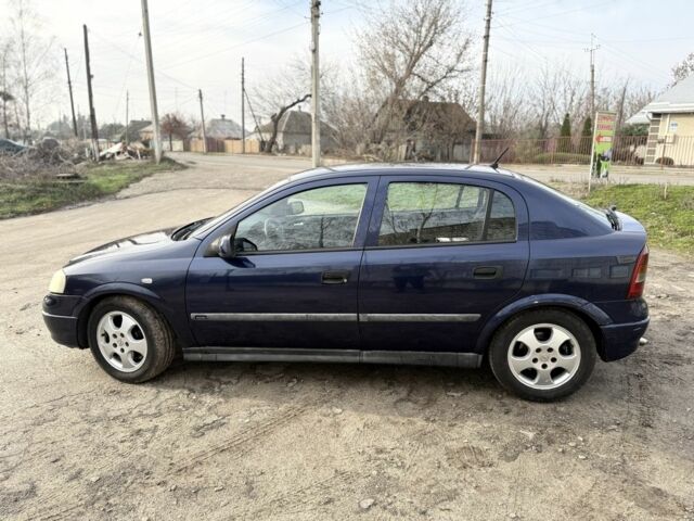 Синий Опель Астра, объемом двигателя 2 л и пробегом 195 тыс. км за 1900 $, фото 7 на Automoto.ua
