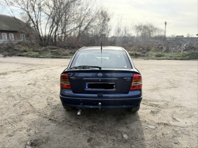 Синий Опель Астра, объемом двигателя 2 л и пробегом 195 тыс. км за 1900 $, фото 5 на Automoto.ua