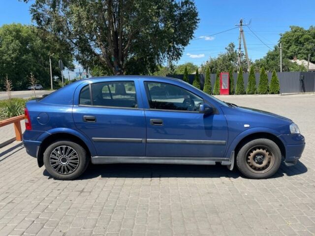 Синій Опель Астра, об'ємом двигуна 1.4 л та пробігом 186 тис. км за 2597 $, фото 3 на Automoto.ua