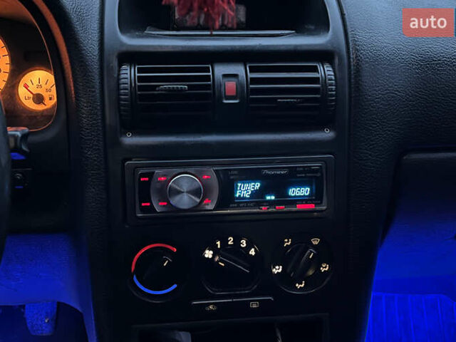 Синий Опель Астра, объемом двигателя 1.4 л и пробегом 347 тыс. км за 3600 $, фото 11 на Automoto.ua