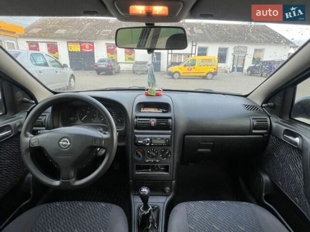 Синий Опель Астра, объемом двигателя 2 л и пробегом 208 тыс. км за 3500 $, фото 8 на Automoto.ua