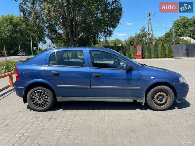 Синій Опель Астра, об'ємом двигуна 1.4 л та пробігом 183 тис. км за 2600 $, фото 5 на Automoto.ua