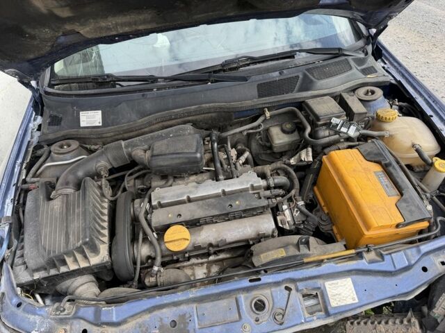 Синій Опель Астра, об'ємом двигуна 1.6 л та пробігом 350 тис. км за 1004 $, фото 1 на Automoto.ua