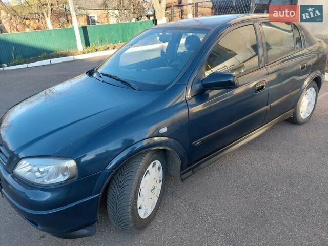 Синий Опель Астра, объемом двигателя 1.82 л и пробегом 380 тыс. км за 3350 $, фото 11 на Automoto.ua