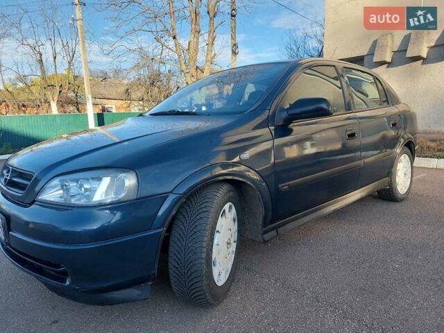 Синий Опель Астра, объемом двигателя 1.82 л и пробегом 380 тыс. км за 3350 $, фото 3 на Automoto.ua