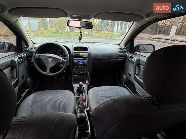 Синий Опель Астра, объемом двигателя 1.4 л и пробегом 473 тыс. км за 2600 $, фото 11 на Automoto.ua
