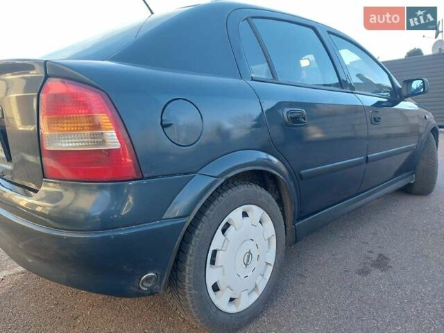 Синий Опель Астра, объемом двигателя 1.82 л и пробегом 380 тыс. км за 3350 $, фото 6 на Automoto.ua