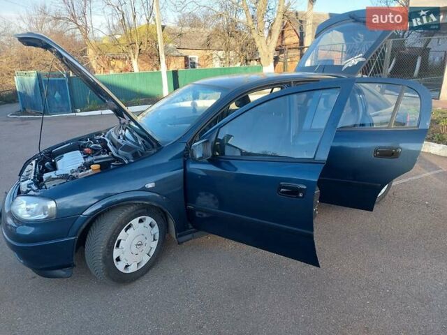 Синий Опель Астра, объемом двигателя 1.82 л и пробегом 380 тыс. км за 3350 $, фото 2 на Automoto.ua