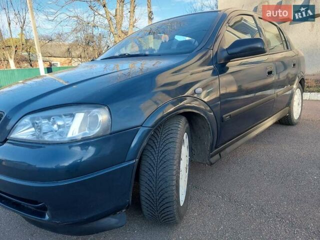 Синий Опель Астра, объемом двигателя 1.82 л и пробегом 380 тыс. км за 3350 $, фото 4 на Automoto.ua