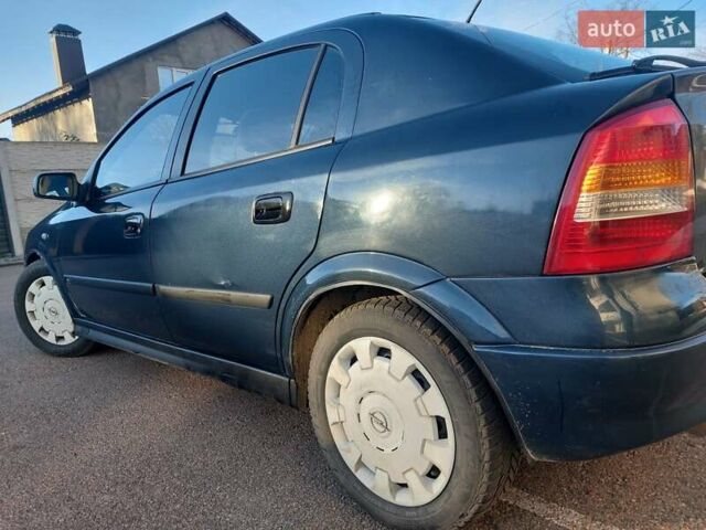 Синий Опель Астра, объемом двигателя 1.82 л и пробегом 380 тыс. км за 3350 $, фото 9 на Automoto.ua