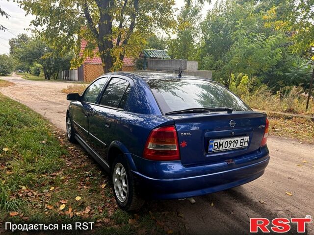 Синий Опель Астра, объемом двигателя 1.2 л и пробегом 218 тыс. км за 3180 $, фото 3 на Automoto.ua