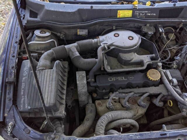 Синий Опель Астра, объемом двигателя 1.6 л и пробегом 270 тыс. км за 850 $, фото 1 на Automoto.ua