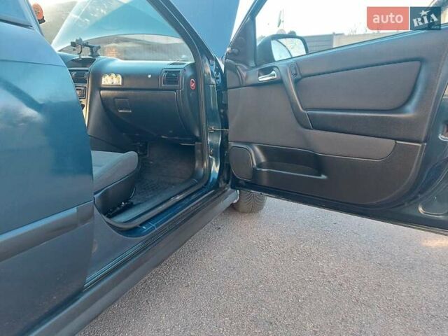 Синий Опель Астра, объемом двигателя 1.82 л и пробегом 380 тыс. км за 3350 $, фото 15 на Automoto.ua