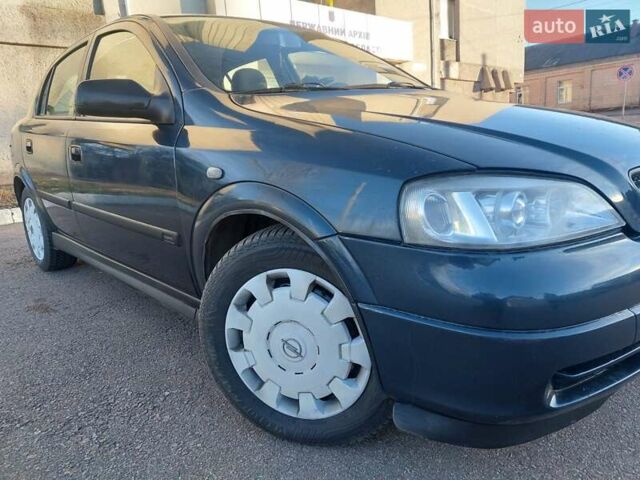 Синий Опель Астра, объемом двигателя 1.82 л и пробегом 380 тыс. км за 3350 $, фото 8 на Automoto.ua