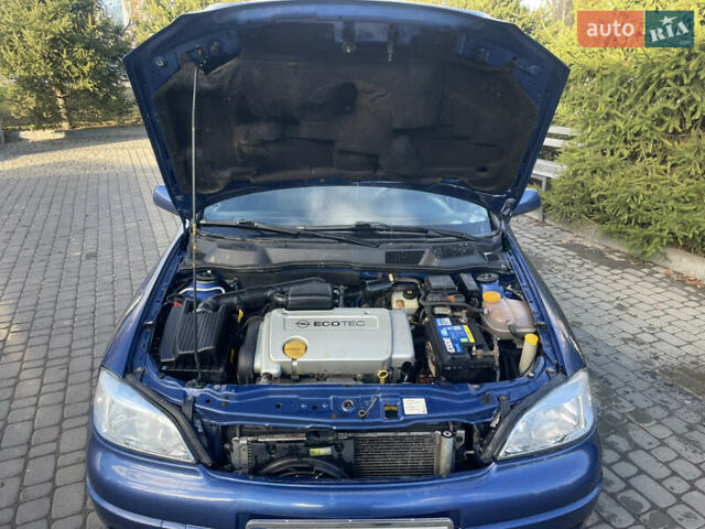 Синій Опель Астра, об'ємом двигуна 1.6 л та пробігом 261 тис. км за 2300 $, фото 21 на Automoto.ua