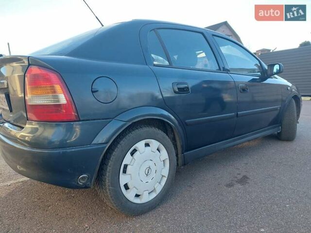 Синий Опель Астра, объемом двигателя 1.82 л и пробегом 380 тыс. км за 3350 $, фото 7 на Automoto.ua