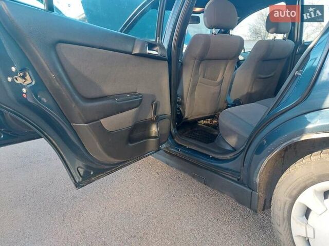 Синий Опель Астра, объемом двигателя 1.82 л и пробегом 380 тыс. км за 3350 $, фото 14 на Automoto.ua