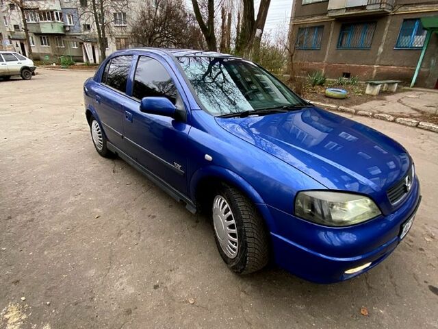 Синий Опель Астра, объемом двигателя 1.6 л и пробегом 289 тыс. км за 3400 $, фото 3 на Automoto.ua