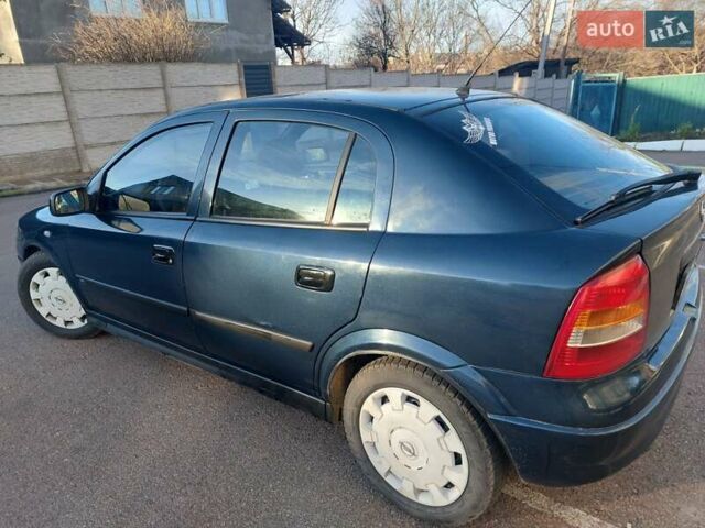 Синий Опель Астра, объемом двигателя 1.82 л и пробегом 380 тыс. км за 3350 $, фото 10 на Automoto.ua