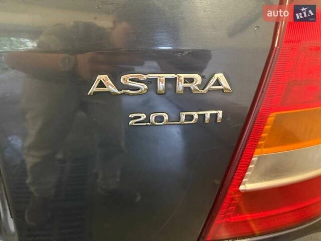 Синий Опель Астра, объемом двигателя 2 л и пробегом 230 тыс. км за 4731 $, фото 9 на Automoto.ua