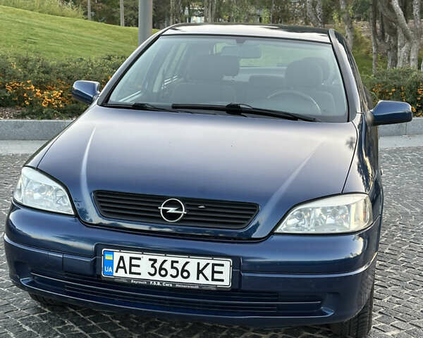 Синий Опель Астра, объемом двигателя 1.6 л и пробегом 220 тыс. км за 3500 $, фото 30 на Automoto.ua