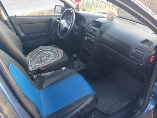 Синій Опель Астра, об'ємом двигуна 1.9 л та пробігом 300 тис. км за 1450 $, фото 7 на Automoto.ua