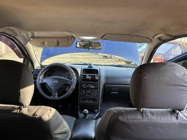 Синий Опель Астра, объемом двигателя 1.6 л и пробегом 452 тыс. км за 2450 $, фото 6 на Automoto.ua